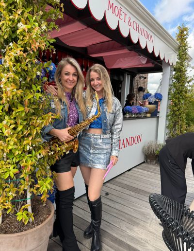 female dj Sax with the DJ